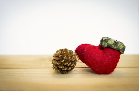 Christmas sock on wood table with space on white backgroundの写真素材