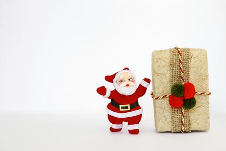 Christmas background, Santa clause and gift box on white backgroundの写真素材