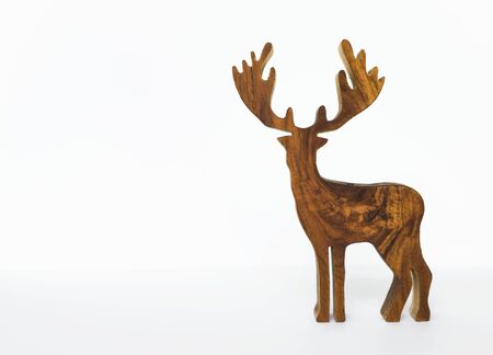 Wood texture reindeer on white background, wooden deerの写真素材