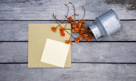 Blank notepad on gold card over vintage background