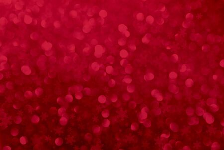 Abstract light bokeh with snow flake on red background, christmast concept background