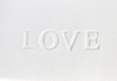Love on white sand background, White valentine concept