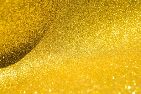 Abstract Gold glitter background, selective focusの写真素材