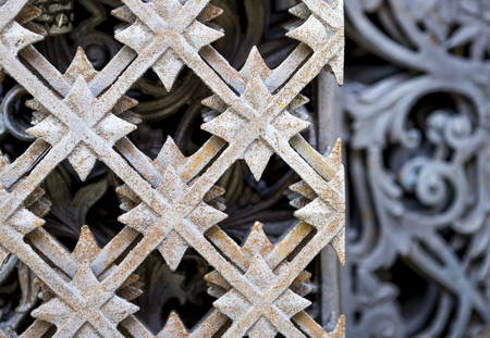 Closeup old iron gate design backgroundの写真素材