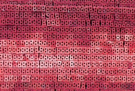 Abstract brick stack background with red filter effectの写真素材