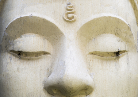 White cement Buddha image face, religion concept, Buddhism symbolの写真素材
