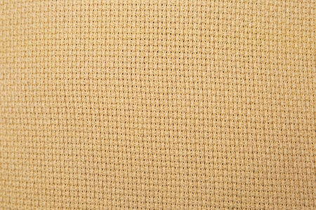 Abstract closeup yellow fabric texture background, blank yellow fabric pattern backgroundの写真素材