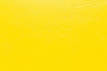 Yellow cement wall, blank yellow background, concrete texture background