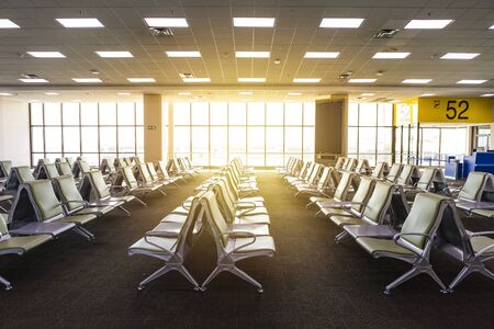 Empty departure gate at the airport in Thailand, no passenger at the waiting hall, airport interior...