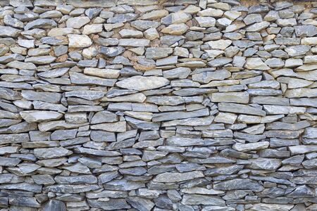 Stone wall background, stack of stone, old wallの写真素材