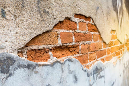 Closeup old brick wall texture background with vintage warm light, ancient building concept...