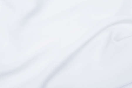 Abstract waving white fabric background, blank white soft fabric pattern backgroundの写真素材