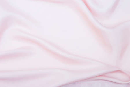Abstract pink fabric texture background, silky pink fabric backgroundの写真素材