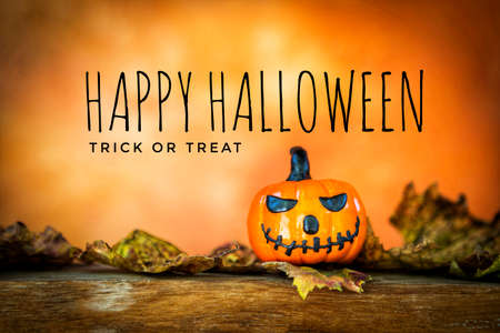 Happy Halloween card idea, Halloween pumpking with space on blurred background, decoration item for partyの写真素材