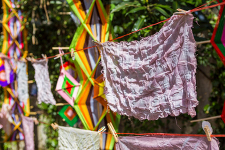 Fabric with Natural Dyeing with Plants hanging to dry outdoor, eco concept, fun craft activityの写真素材