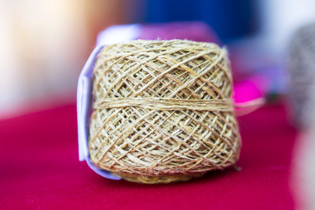 Closeup natural thread roll with nature, organic and eco product for craft and cloth making, product of Thailandの写真素材
