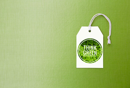 Think green tag on green texture background, eco green concept background
