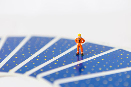 Miniature worker standing on tarot card with space on white background, Tarot reading work and career, fortune tellerの写真素材