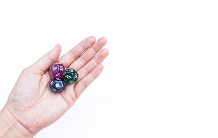 Dice divination in girl hand isolate on white background, astrological dices fortune telling...
