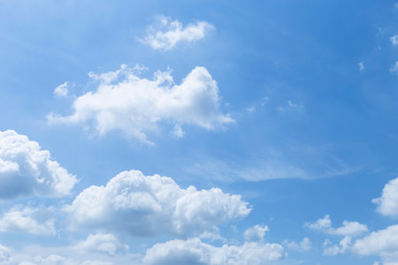 Clear blue sky with white rain cloud, weather and season background, natue conceptの写真素材
