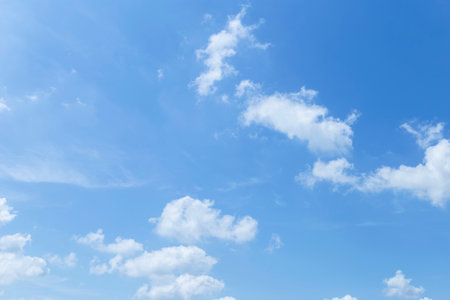 Clear blue sky with white rain cloud, weather and season background, natue conceptの写真素材