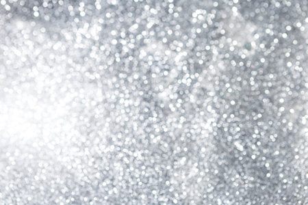 Abstract silver glitter bokeh background, festive and holiday concept background