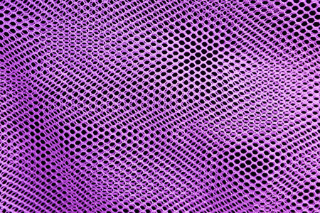 Purple net on black fabric background, purple net texture backgroundの写真素材