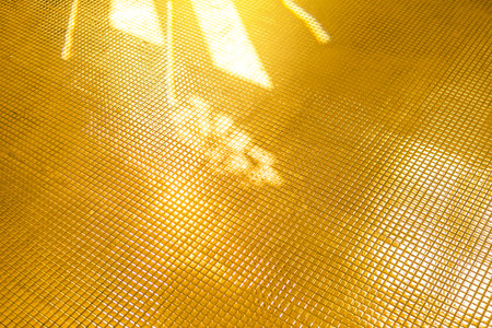 Abstract shiny golden mosaic floor background, gold mosaic pattern background