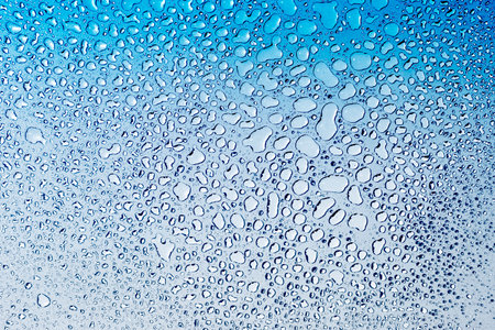 Abstract water drop on gradiant blue background, drops pattern background
