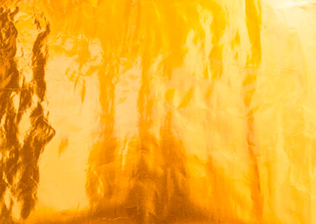 Abstract gold paper texture background, blank yellow paper pattern backgroundの写真素材