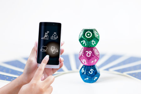 Astro app on smartphone in girl hand over stack of Dice divination with tarot card on background,...