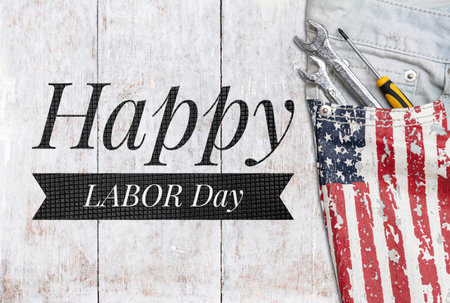 Happy Labor day banner on white wood background with USA flag on jean pocket with tools, Labor day...