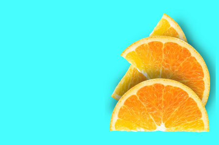 Oranges  slice fruit  on blue background.