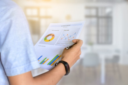 Business people are reading paper and analyzing business report forms