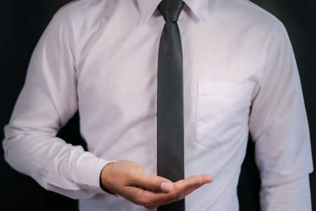 close up of businessman hand holding empty for text or picture and copy spaceの写真素材