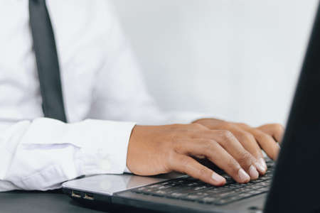 close up hand of Businessman typing on keyboard or laptopの写真素材