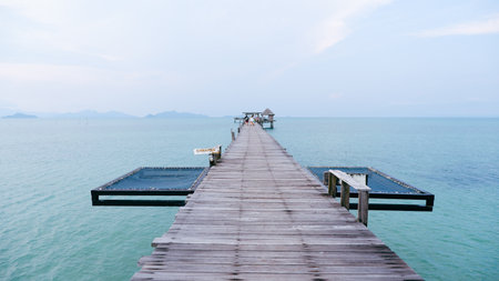Wooden bridge to the sea at Koh Samui, Thailand.
