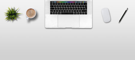 Laptop and coffee cup on white background. Top view. Flat layの写真素材