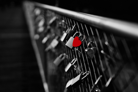 Heart shaped padlock on bridge in Munich Germanyの写真素材