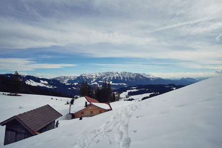 Winter snow covered mountain peaks in Europe. Great place for winter sportsの写真素材