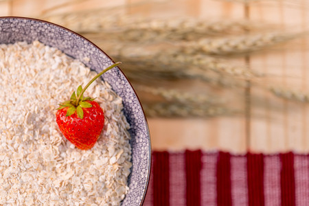 Strawburry in malt serial on wood background
