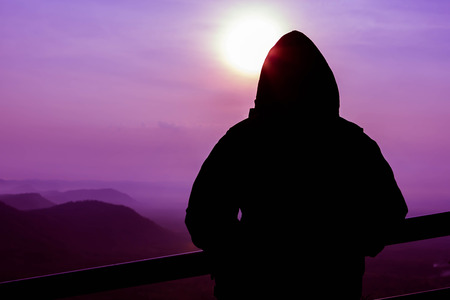 Soft of Focus and Silhouette of young man on Senrise Top View at Pha Mor Ie Deang , Srisaket ,Thailandの写真素材