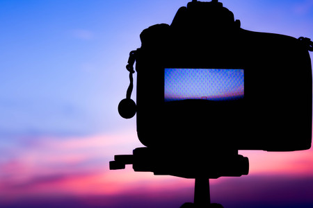 Silhouette Filter : DSLR camera focus on sunrise lanscape sceenの写真素材