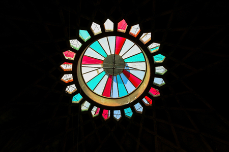 Colored glasses decoration on the peak of the dome to bring sunlight inside the room,shiraz,Iranの写真素材