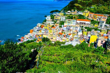 coastal view of Cinque Terre, the Riomaggiore village which is a small village in the Liguria region of Italy.の写真素材