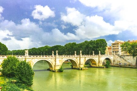 bridge over tiber river in Rome, Italyの写真素材