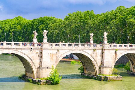 Angel bridge over tiber river in Rome, Italyの写真素材
