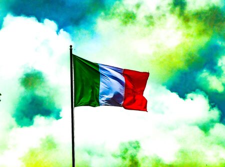The Italian flag flowing  in a viberant and colorful morningの写真素材