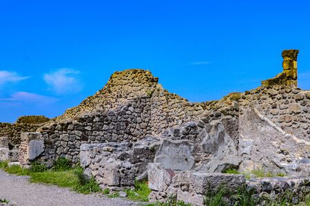 Exploring the houses and streets of the ancient city of Pompeii which is an ancient Roman city near Naples Italy that was  destroyed by  the eruption of Mount Vesuviusの写真素材