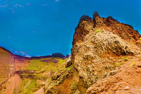 exploring one of the craters of the world's most dangerious volcano which in on Mount Vesuvius near Pompeii in Italyの写真素材